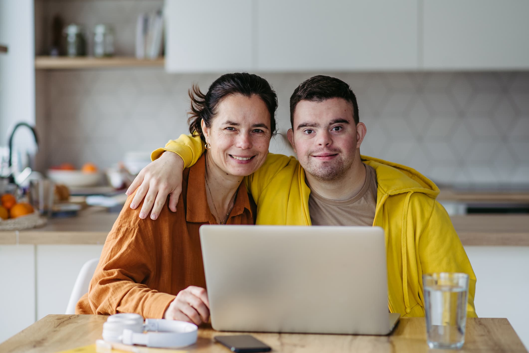 Caregiver and person embracing